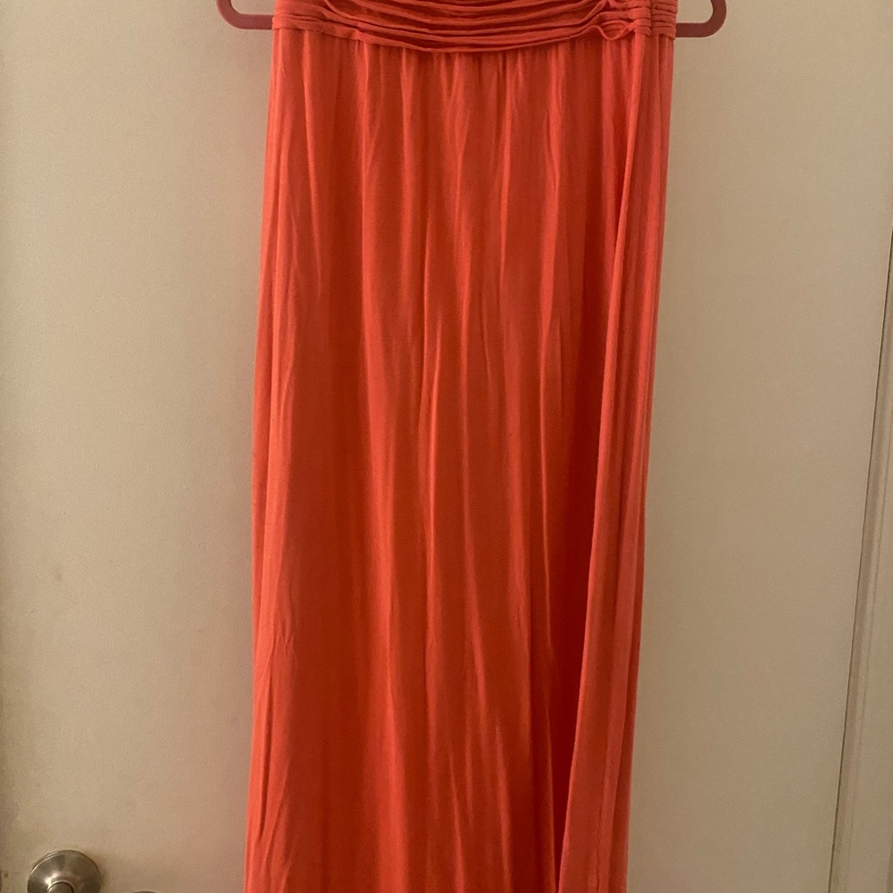 Orange long skirt.